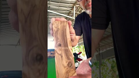 Cutting olive wood to make knife handles set.All the olive wood comes from my own farm.