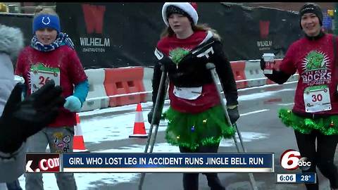 Girl who lost leg in train accident runs Jingle Bell Run