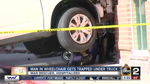 Man in wheelchair trapped under vehicle at Sinai Hospital