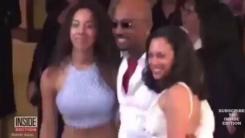 Montell Williams introducing his side Piece Kamala Harris to the Paparazzi back in 2001