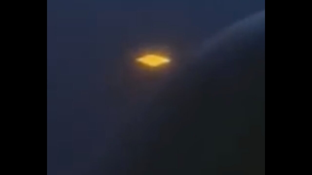 Golden UFO Caught on Video from Plane