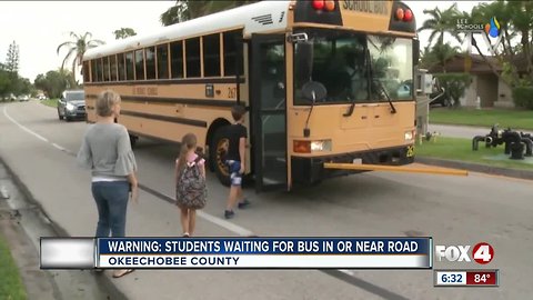 Florida students asked to stop lying in road