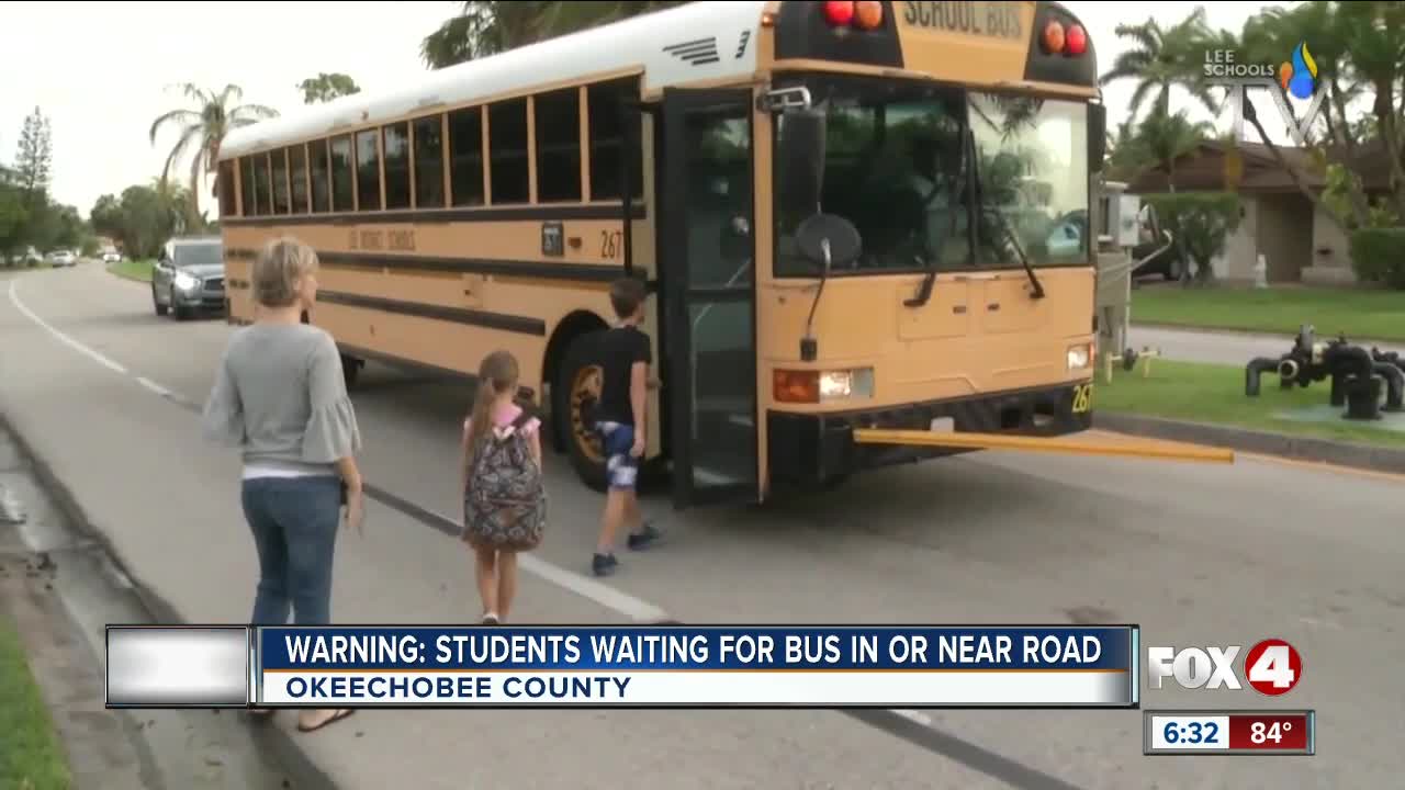 Florida students asked to stop lying in road