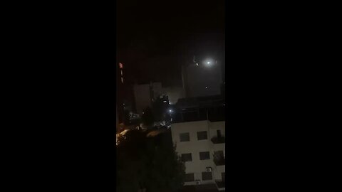 Closer footage of the residential building falling after Israeli air strike