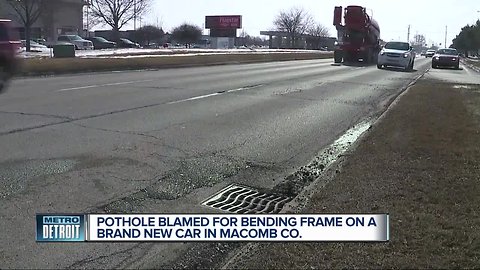 Pothole in Macomb County wrecks new car's suspension, bends frame