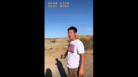 An Asian man, firing his weapon, declares a dark promise to conquer America (California)
