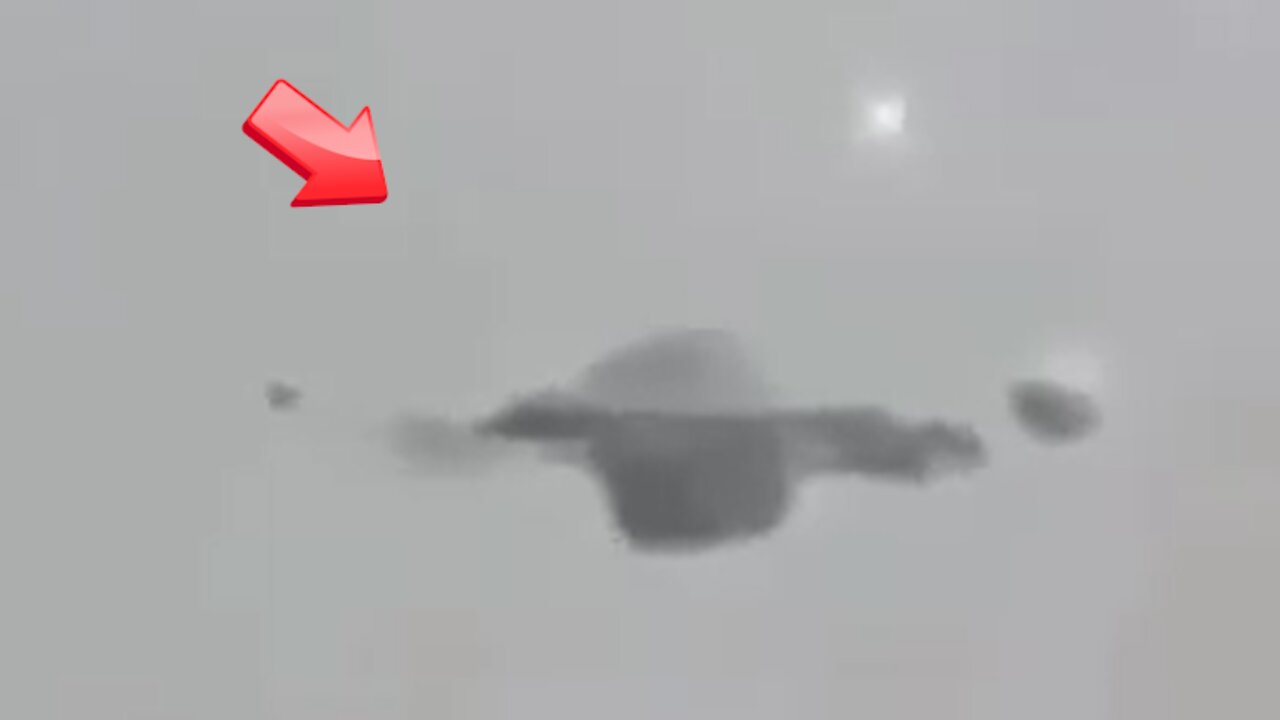 UFO shaped like Saturn and small UFO and light body floating [space]