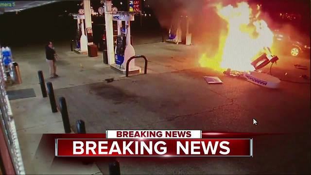 Fiery crash at gas station caught on video