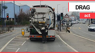 Jaw-dropping moment cyclist hitches a lift by hanging onto back of moving truck