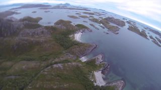 BASE jump POV over stunning Norwegian landscape