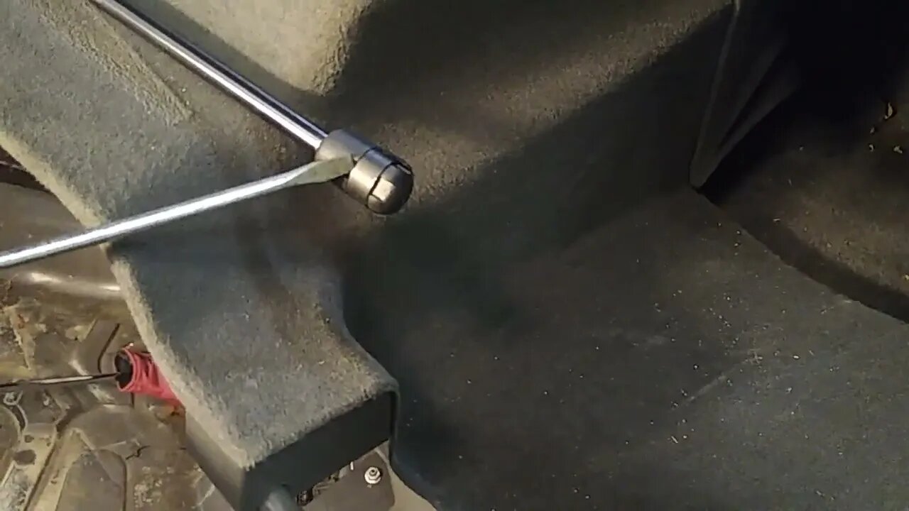 Replacing trunk lid struts on a Mercedes R230 SL500.-8