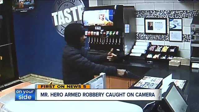 Mr. Hero armed robbery caught on camera