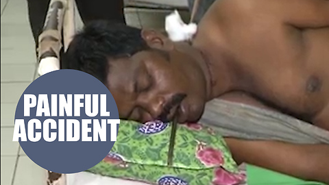 A motorcyclist fell off his bike and was impaled on a metal rod