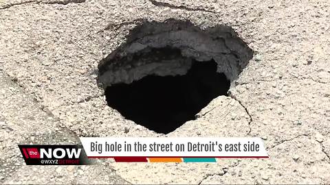 Big hole opens in street in Detroit