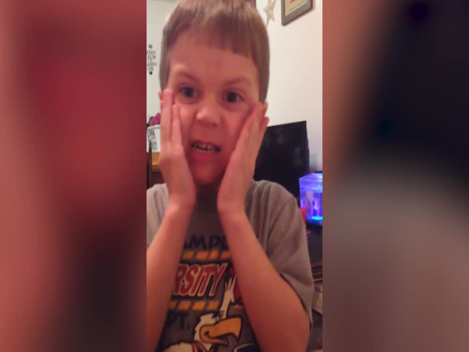 Boy makes Hilarious Faces when Trying Sour Candy