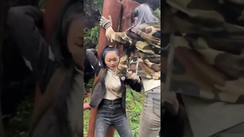 Chinese Countryside Girl Trapped Under Two Logs