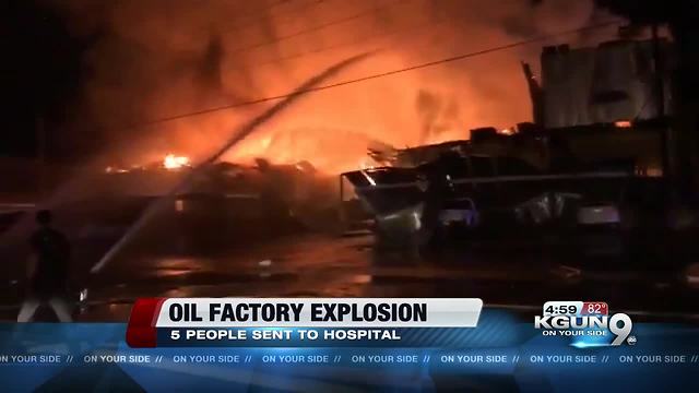 Five sent to hospital after explosion, building fire on southside
