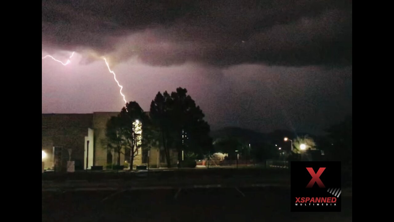 New Mexico lightening strikes at night facing Sandia mountains