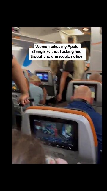 Man goes off after he catches a woman stealing his phone charger on a flight to Miami, Florida.