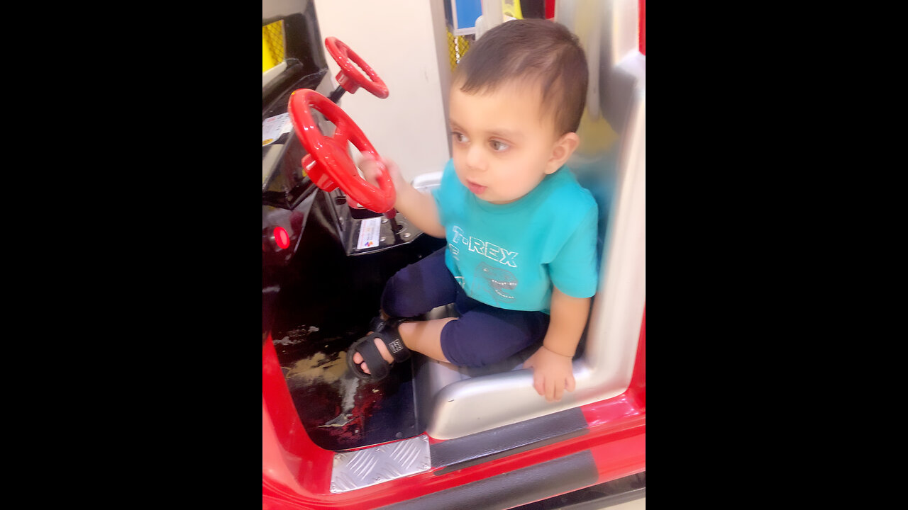 Little boy driving the car