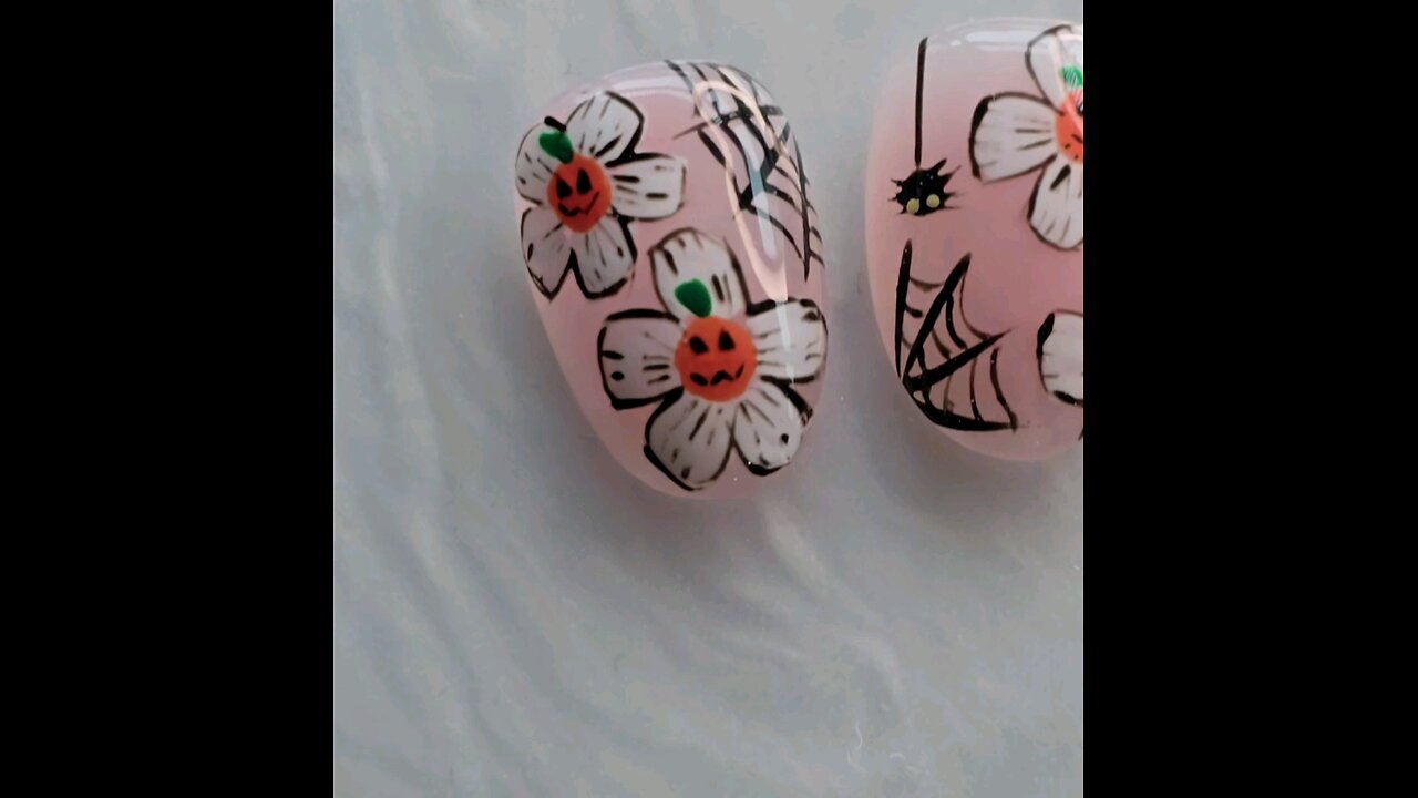 Floral pumpkins and spiderwebs