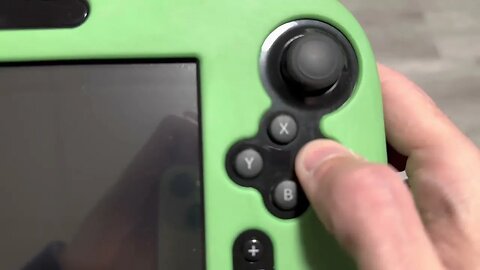 Wii U Gamepad after tear down and jiggly button repairs