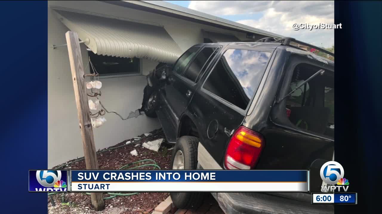 Car crashes into SUV, launching it into a house in Stuart