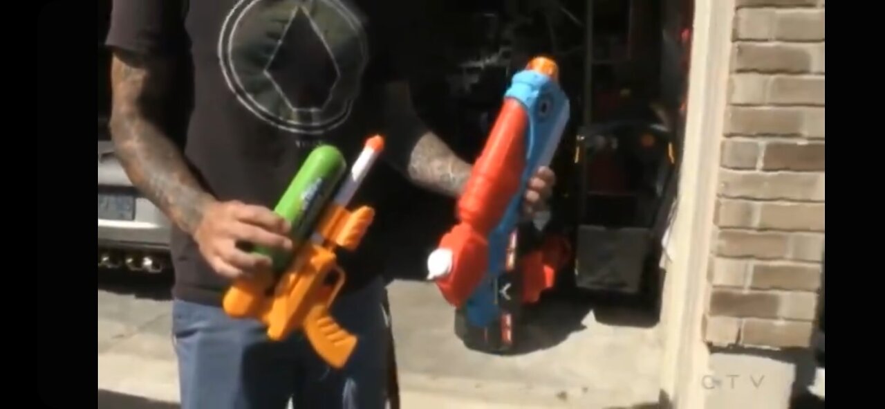 woman being charged with assault with a weapon over a water gun...