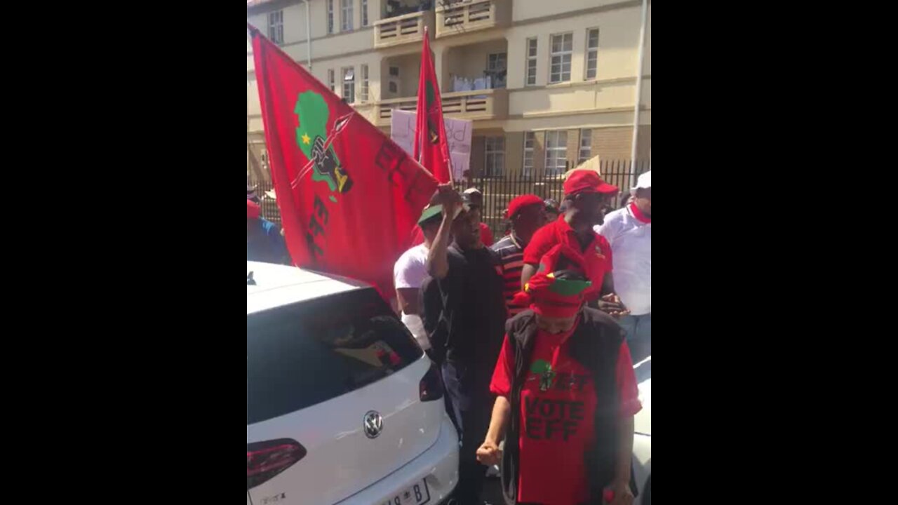 EFF members outside Hillbrow police station