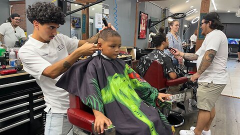 Tampa barber gives back to hometown with free back-to-school haircuts