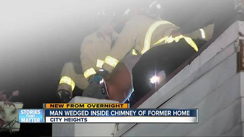 Man wedged inside chimney of former home