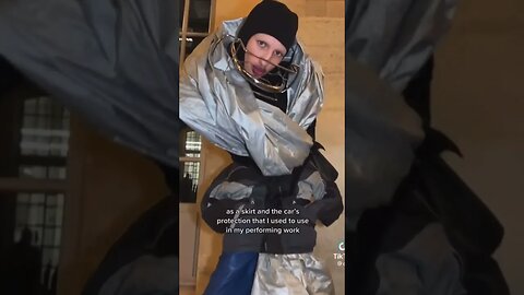 WHAT IS THIS MAN WEARING?!