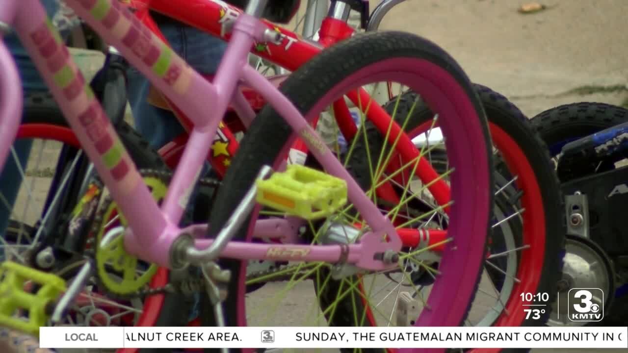 Omaha firefighters give away bikes and helmets