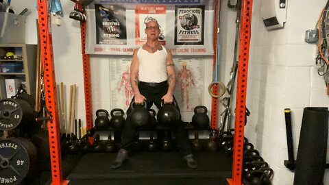 Dual Kettlebell Uneven Deadlifts