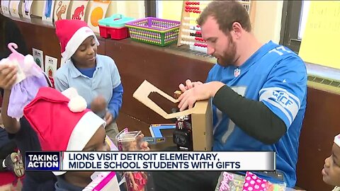 Lions visit Detroit elementary, middle school students with gifts