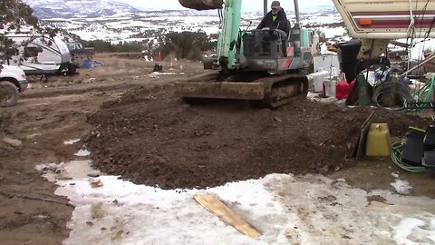 Yanmar YB 451 Excavator Spreading Gravel On A Driveway