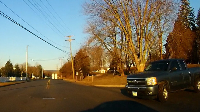 Motorist nearly T-bones truck