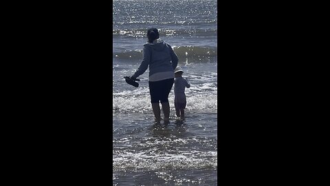 My Grandson first time in the sea.