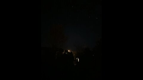 Moon with stars in the sky during the night