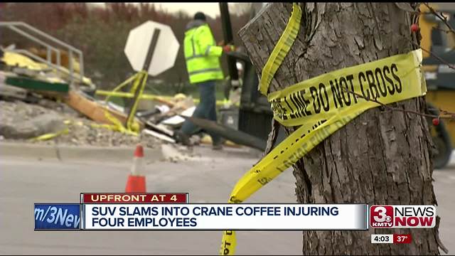 SUV slams into coffee shop