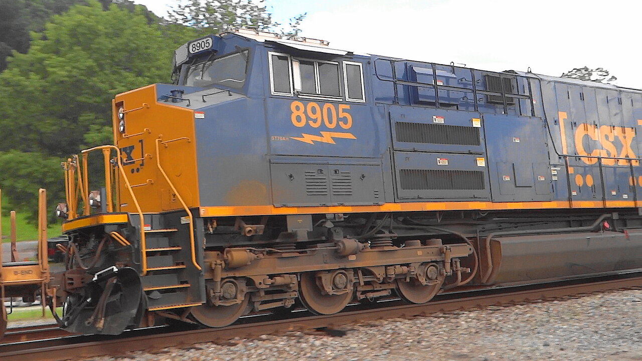 CSX Train with Rebuilt GE and New EMD ST70ACe Locomotives