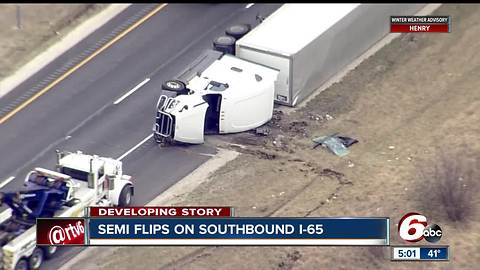 Semi flips on I-65 in Clinton County