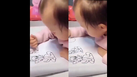 3 years old girl making drawing