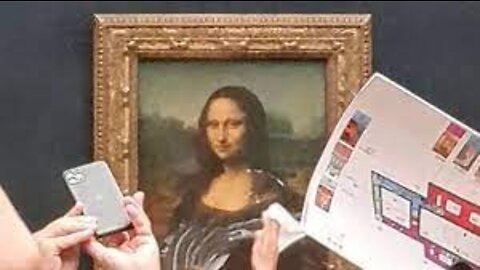 Mona Lisa smeared in cream in climate protest stunt