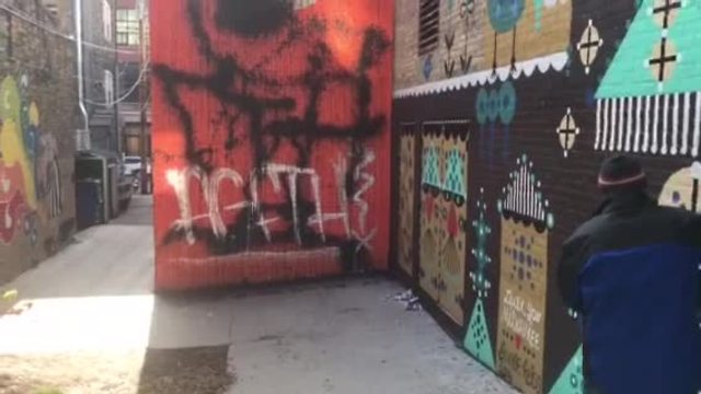 Black Cat Alley mural on Milwaukee's east side vandalized