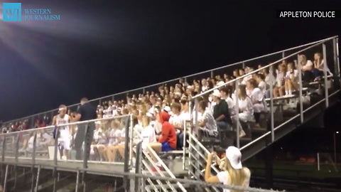 Police Officer Leads Comical Chant At Football Game