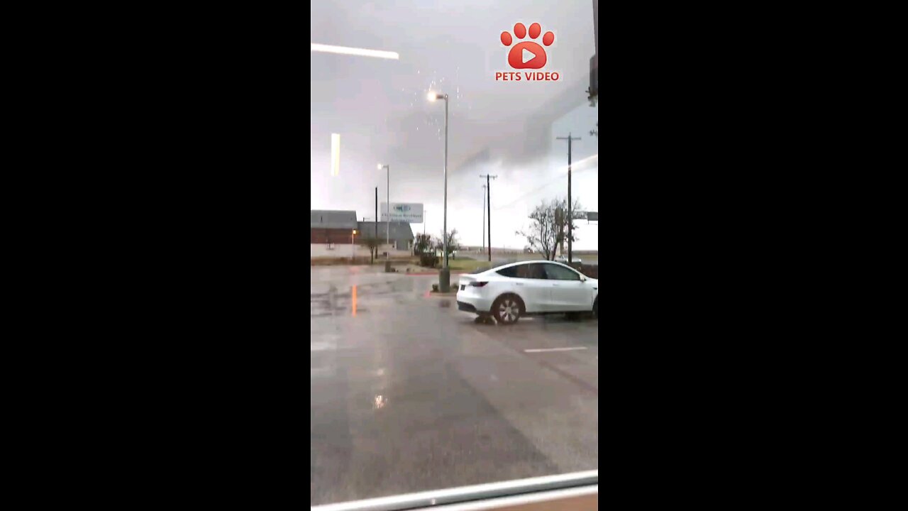 Round Rock Tornado Forming in the Distance From Car Dealership