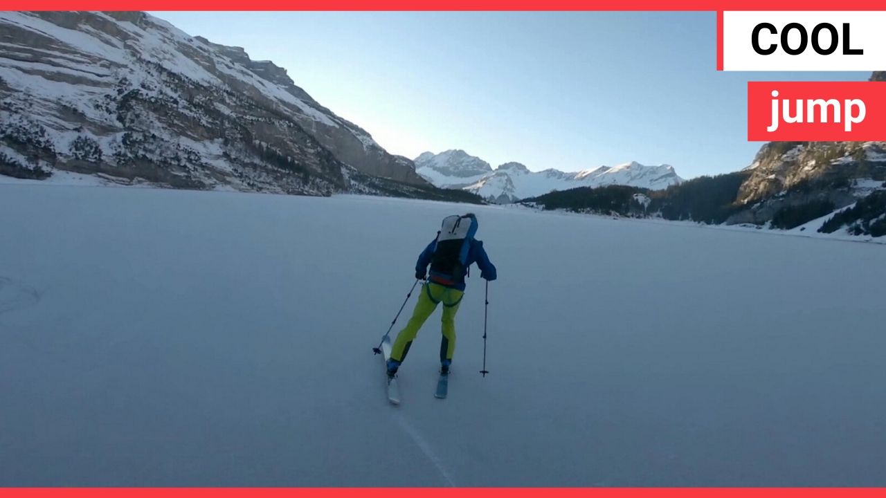 Heart stopping moment base jumpers take a leap of faith off an Icy mountain