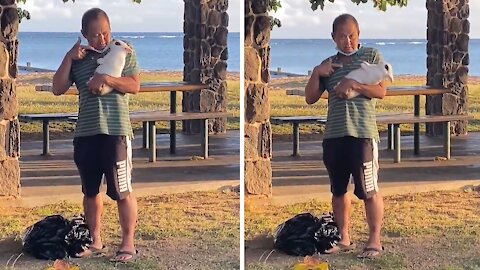 Man teaches his bunny rabbit how to play dead