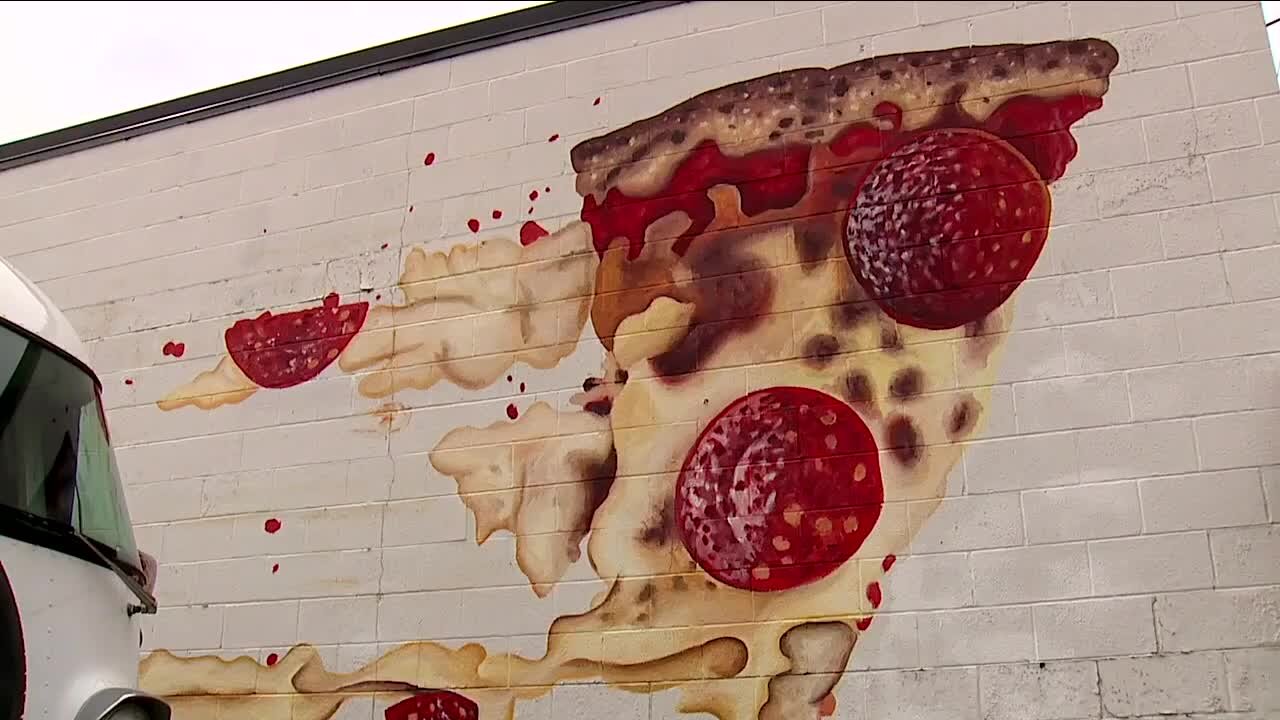 Here's the story behind the biggest slice of pizza in Cleveland -- the much-Instagrammed Pizza Mural